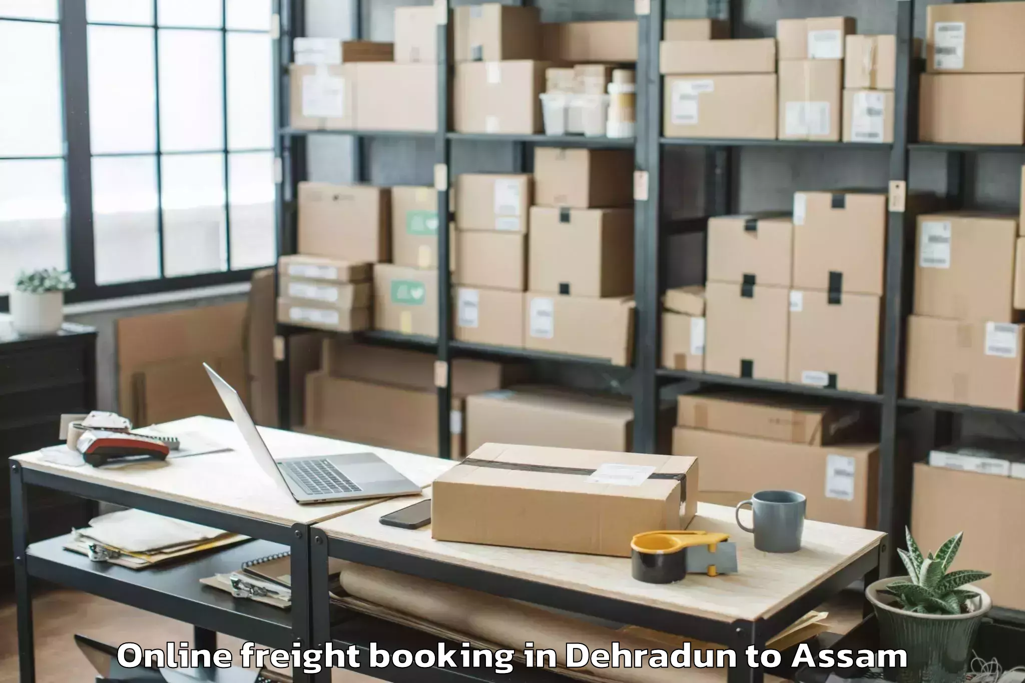 Efficient Dehradun to Hajo Online Freight Booking